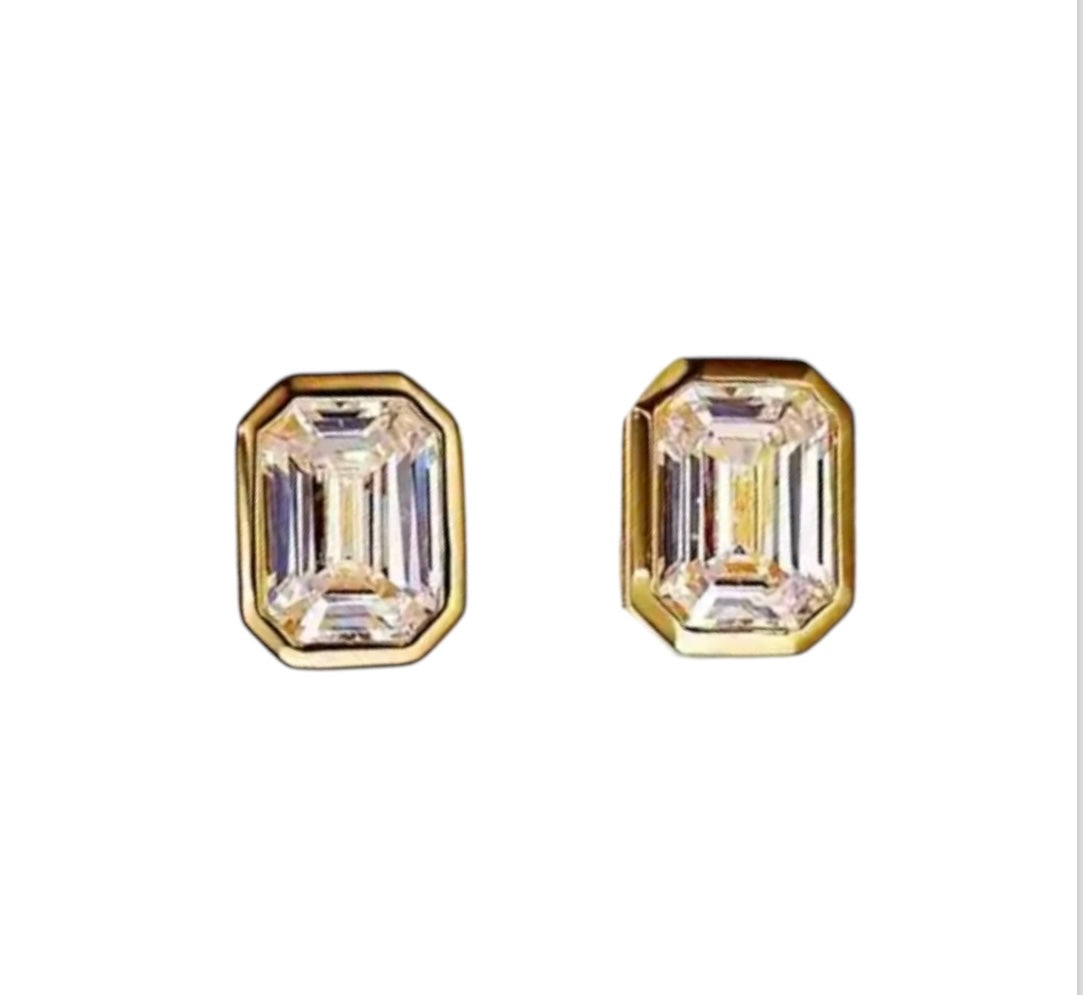 Gold emerald cut studs