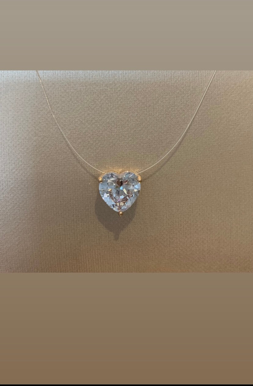 Heart shaped floating Diamond rose gold